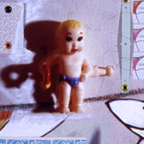 pigment ink print on archival canvas of toys/sketches, legos, wooden blocks, contact paper, grommets