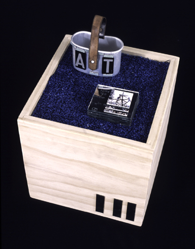 alternative book with small mirrors in a tin with handle of sock monkeys in love