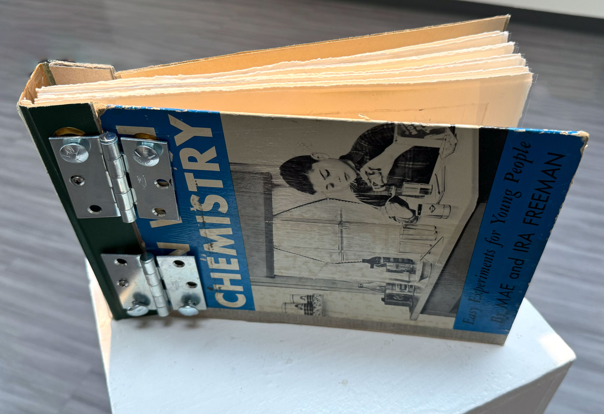 book with hardware binding, copperplate etching, mixed-media collage