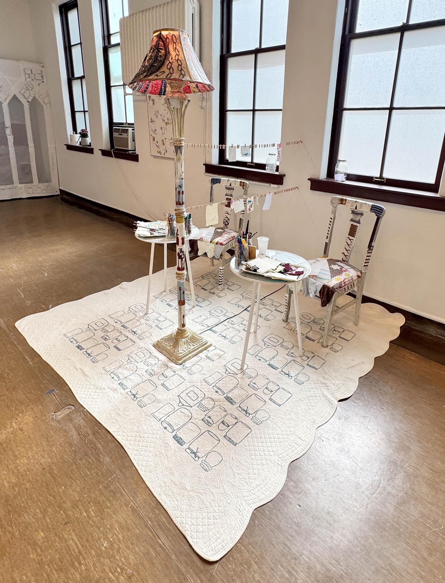 mixed-media installation - collage, monoprint, sewing with lamp, two chairs, two tables, audience participation archive