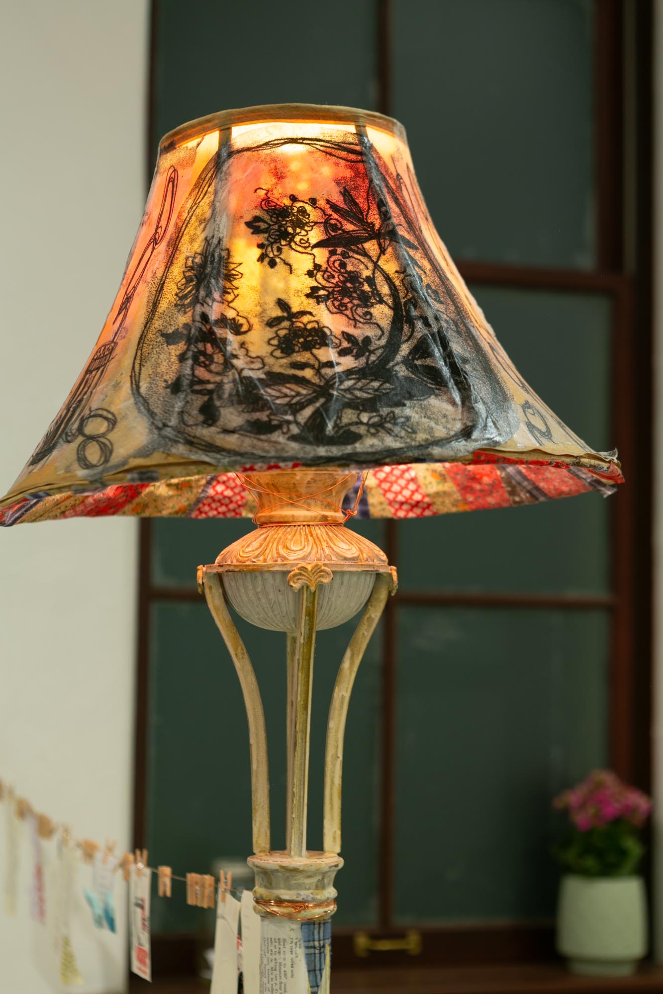 mixed-media installation - collage, monoprint, sewing with lamp, two chairs, two tables, audience participation archive