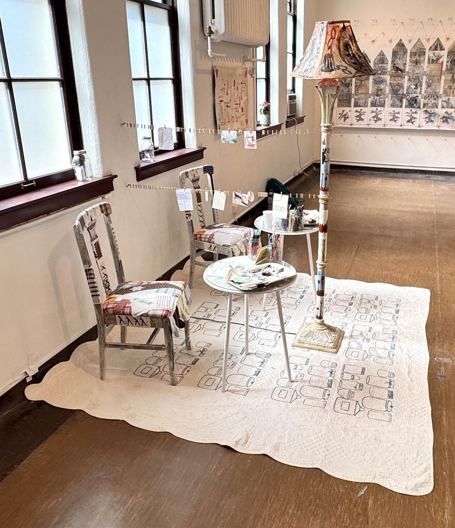 mixed-media installation - collage, monoprint, sewing with lamp, two chairs, two tables, audience participation archive