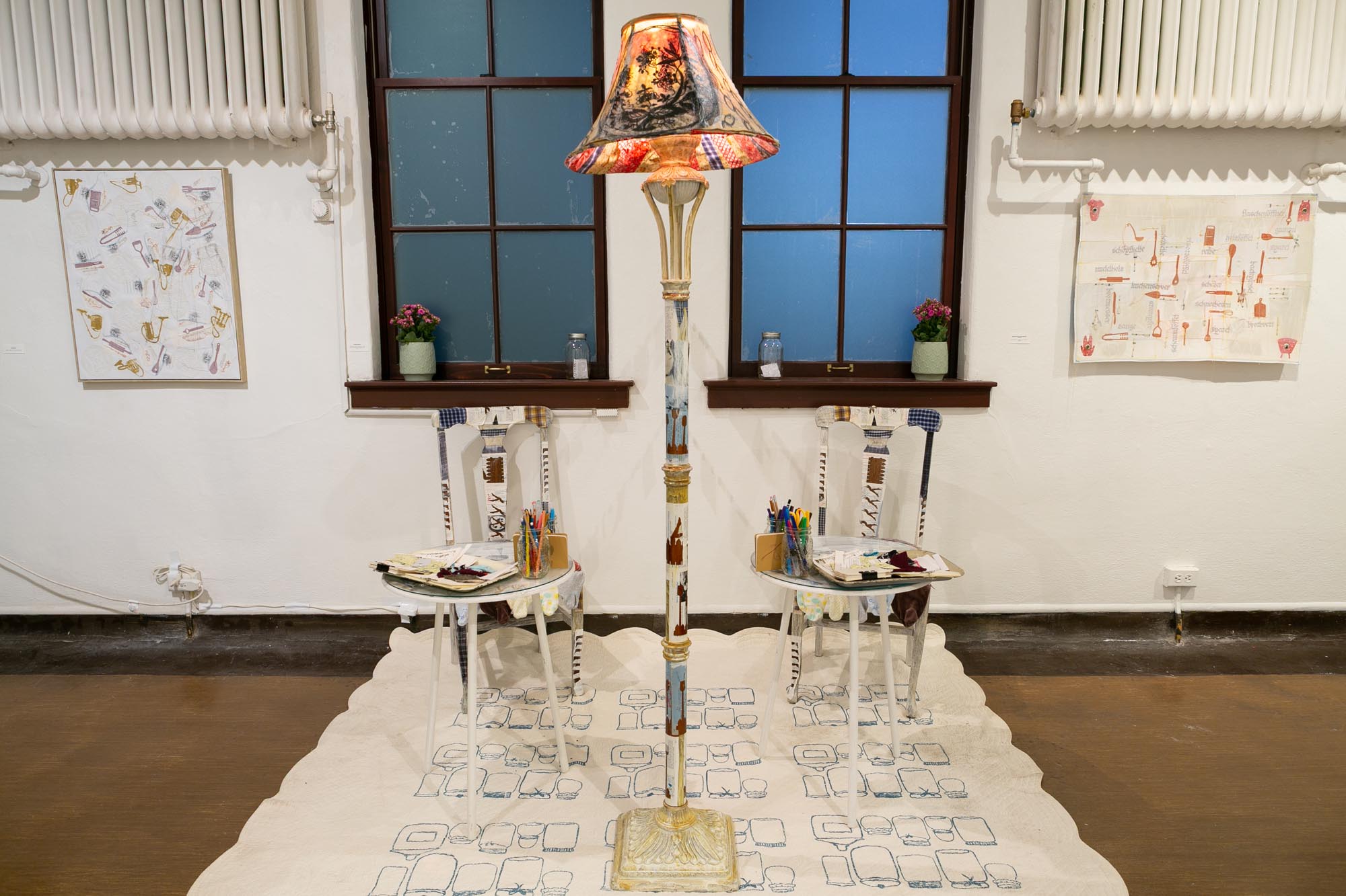 mixed-media installation - collage, monoprint, sewing with lamp, two chairs, two tables, audience participation archive