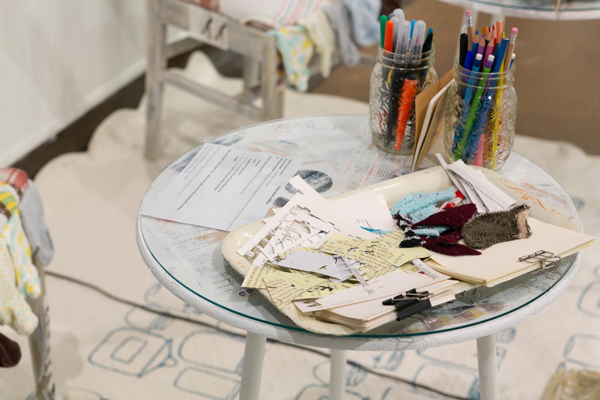 mixed-media installation - collage, monoprint, sewing with lamp, two chairs, two tables, audience participation archive