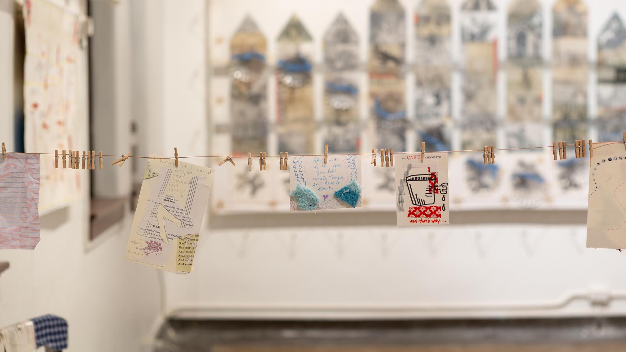 mixed-media installation - collage, monoprint, sewing with lamp, two chairs, two tables, audience participation archive