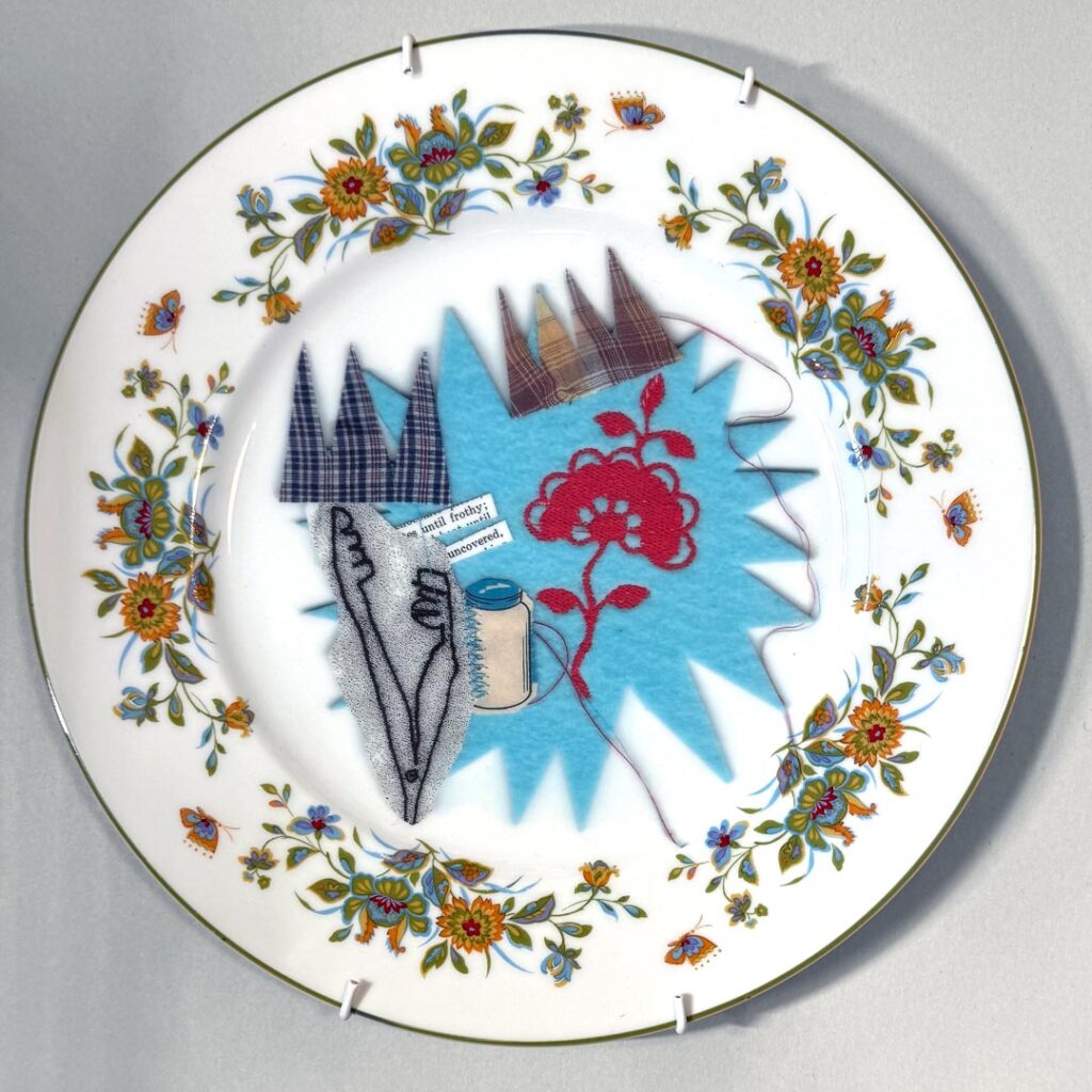 mixed-media collage on dinner plate