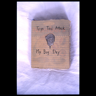 collaged cardboard children’s book with silver cast cover, inkjet photographs, contact paper